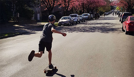 Young boy skateboarding in Vancouver
