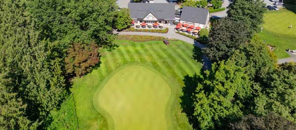 Fraserview Golf Course greens and clubhouse Fraserview Golf Course greens and clubhouse