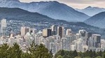 A cityscape of Vancouver looking towards the North Shore mountains. A cityscape of Vancouver looking towards the North Shore mountains.